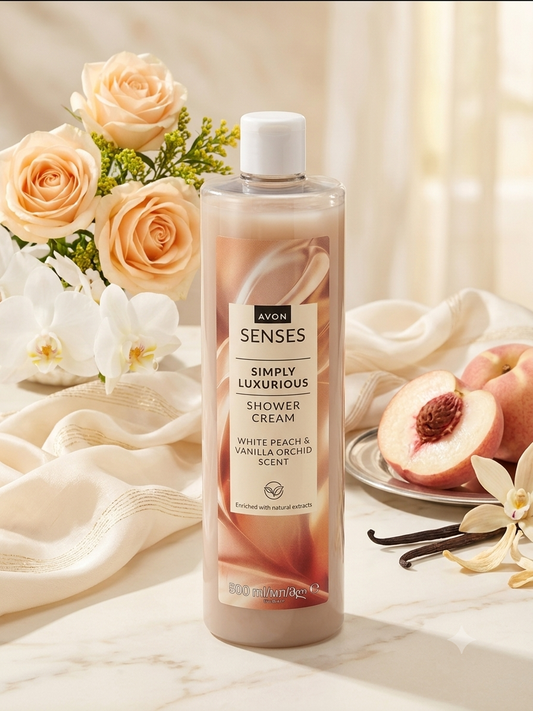 "Flacon de 500ml de gel douche crème Avon Senses Simply Luxurious, au parfum de pêche blanche et d'orchidée vanille."